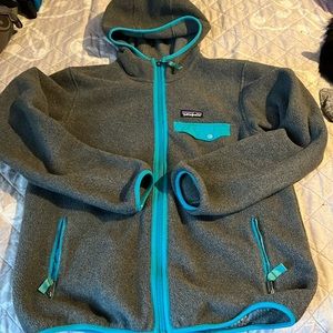 Patagonia Women’s Fleece Size Medium. Gently used  Gray and teal trim. Warm!